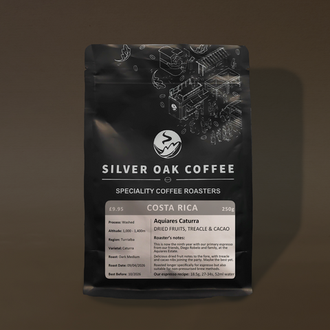 Silver Oak Coffee packaging on a dark background