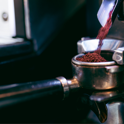 coffee grinding into a portafilter