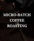 text stating "microbatch coffee roasting" over an image of coffee being roasted