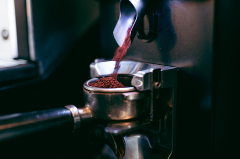 Coffee grinding into a portafilter